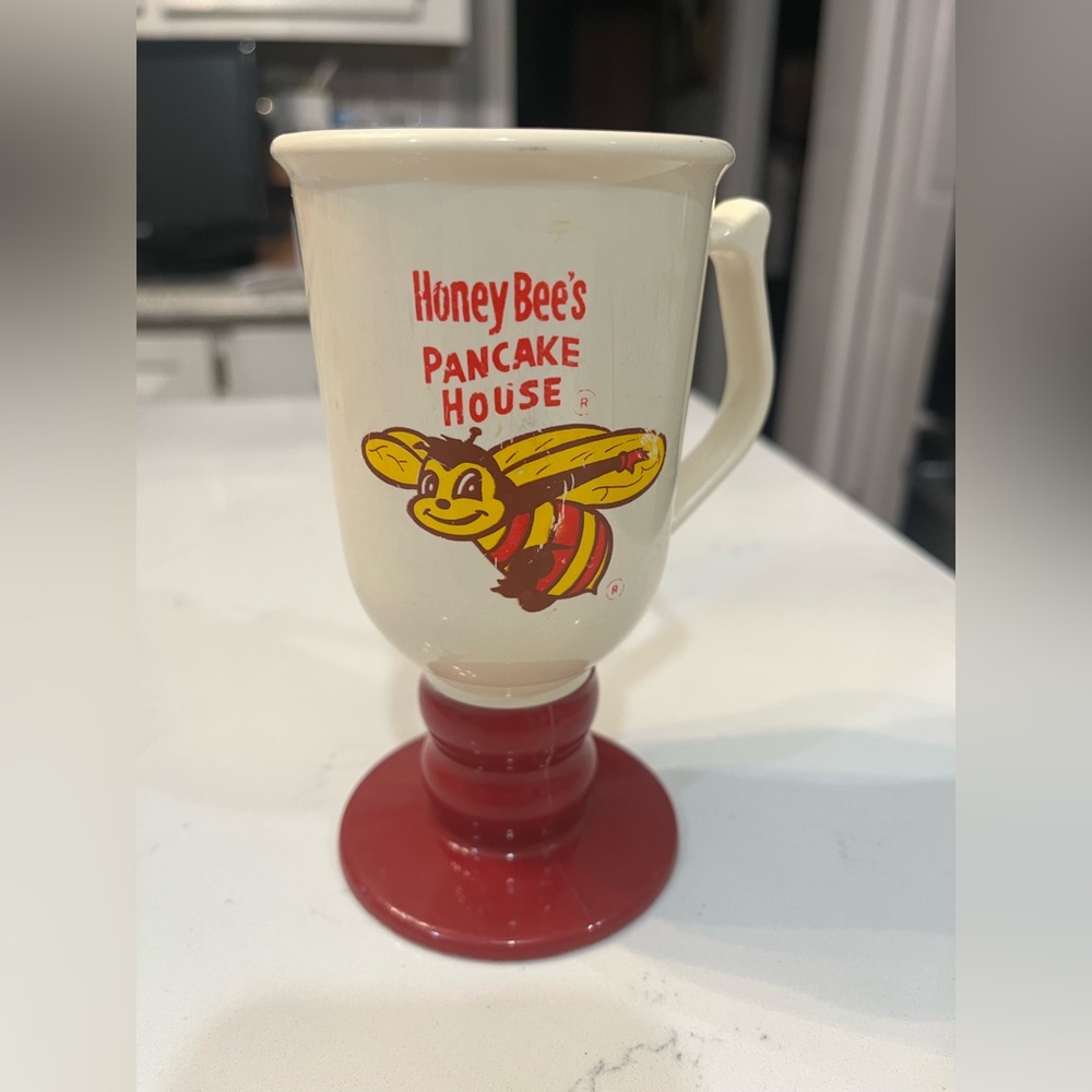 Cream Plastic Pedestal Mug with Red Base
